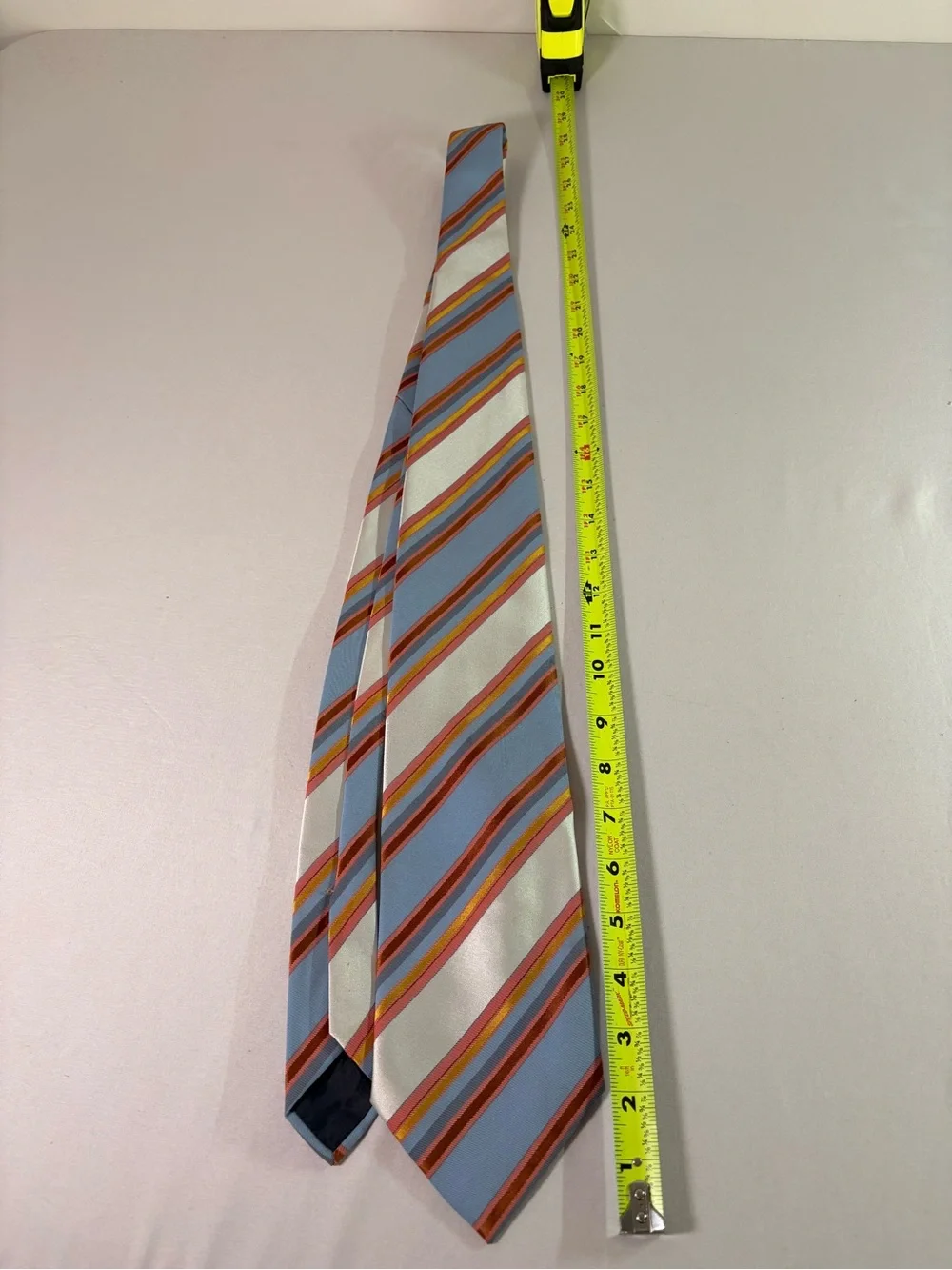 Light Blue Striped Men's Tie with Red and Orange Accents